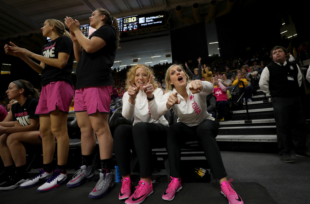 Athletic Trainer Jennie Sertterh and strength and conditioning coach Lindsay Dinkelman against the Wisconsin Badgers Sunday, February 16, 2020 at Carver-Hawkeye Arena. (Brian Ray/hawkeyesports.com)