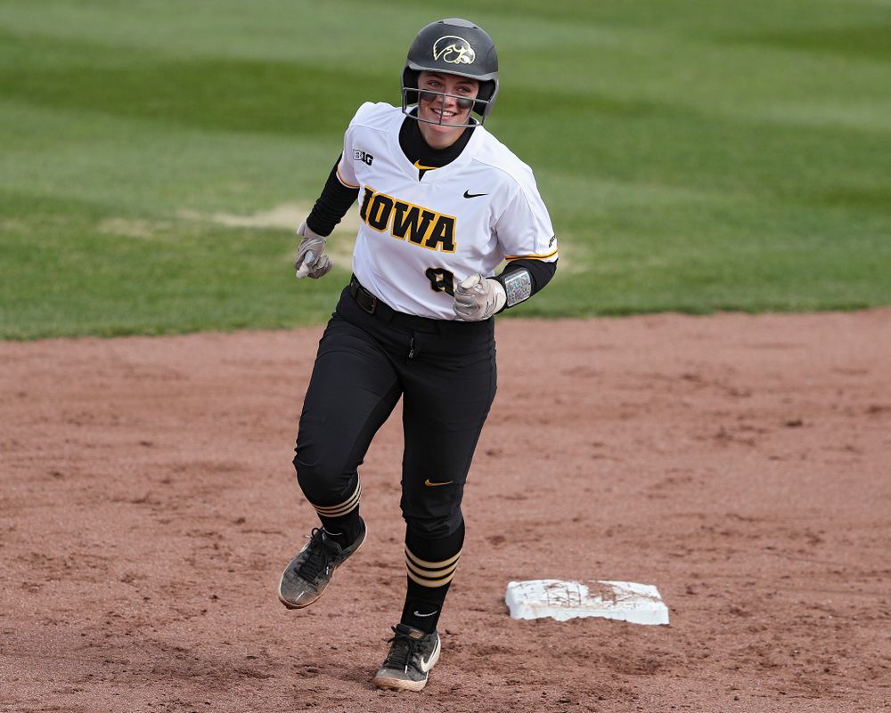 Iowa catcher Abby Lien (9) rounds the bases after hitting a home run during the second inning of their game against Illinois at Pearl Field in Iowa City on Friday, Apr. 12, 2019. (Stephen Mally/hawkeyesports.com)