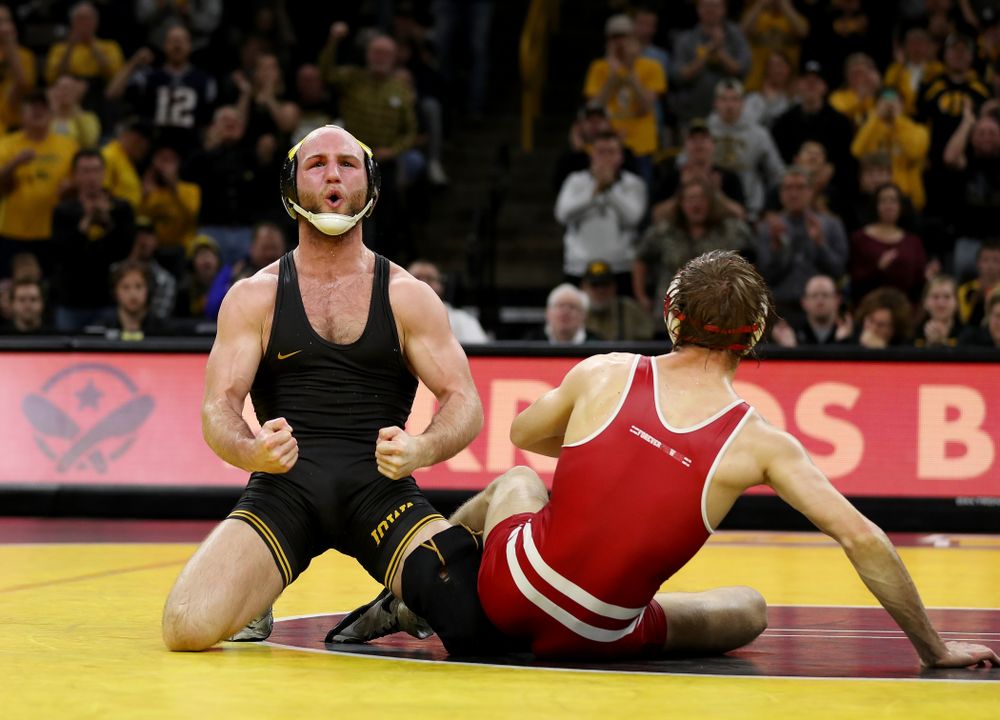 IowaÕs Alex Marinelli wrestles WisconsinÕs Evan Wick at 165 pounds Sunday, December 1, 2019 at Carver-Hawkeye Arena. Marinelli won the match 4-2. (Brian Ray/hawkeyesports.com)