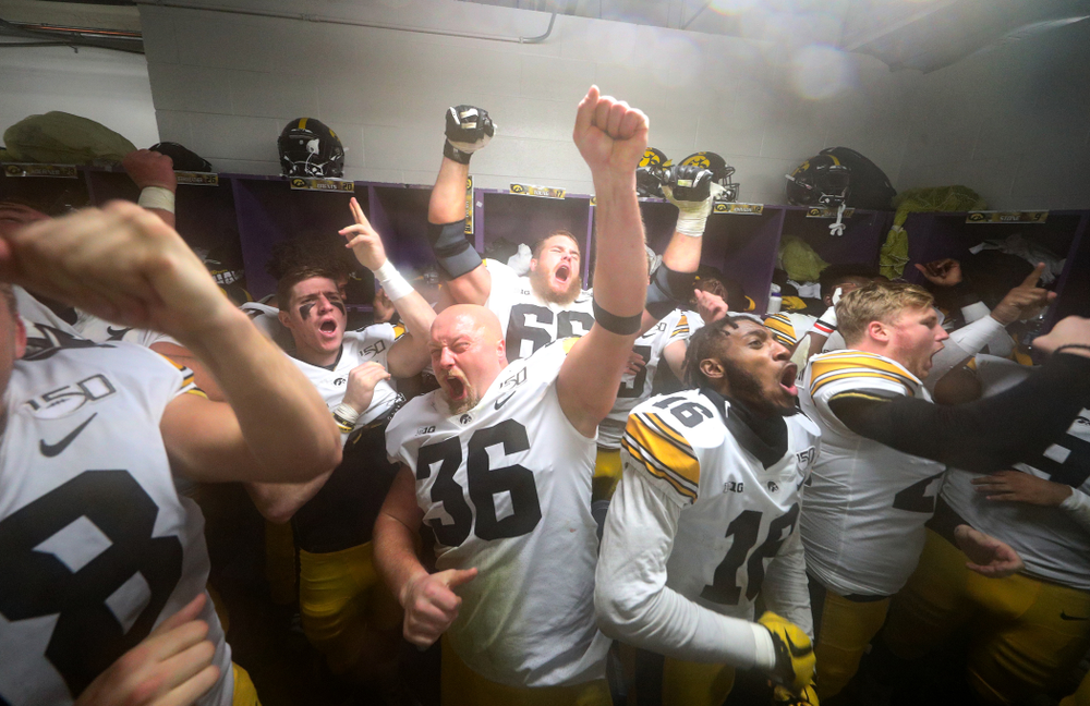Iowa Hawkeyes fullback Brady Ross (36) sings the ÒFight SongÓ following their victory against the Northwestern Wildcats Saturday, October 26, 2019 at Ryan Field in Evanston, Ill. (Brian Ray/hawkeyesports.com)