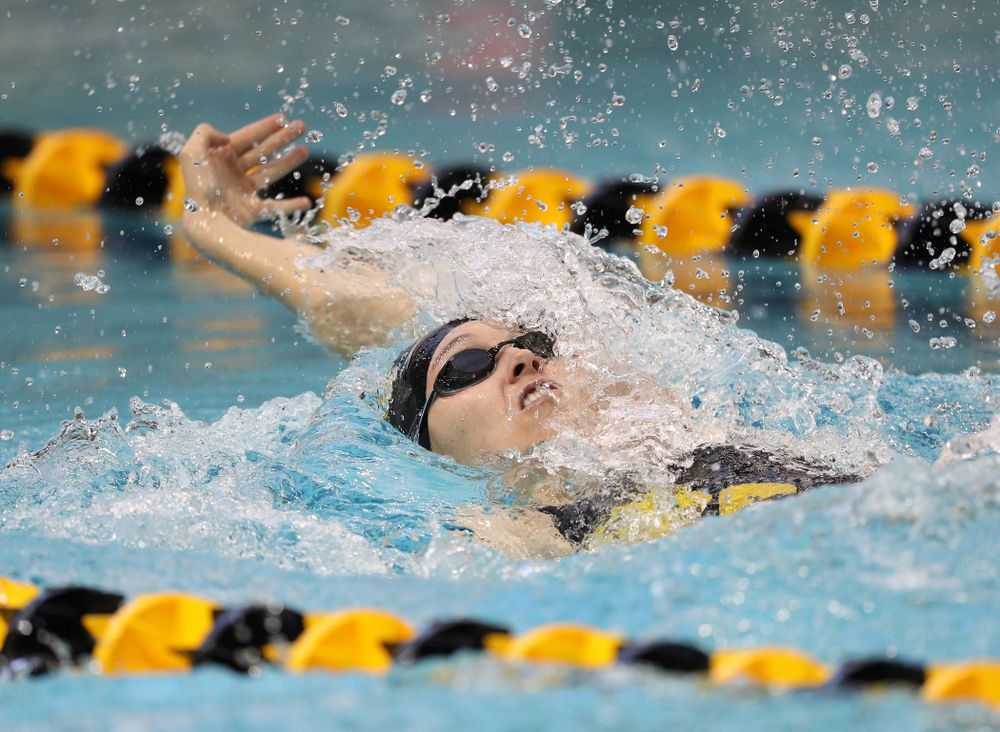 Iowa's Samantha Sauer swims the 100 yard backstroke during a double dual against Wisconsin and Northwestern Saturday, January 19, 2019 at the Campus Recreation and Wellness Center. (Brian Ray/hawkeyesports.com)