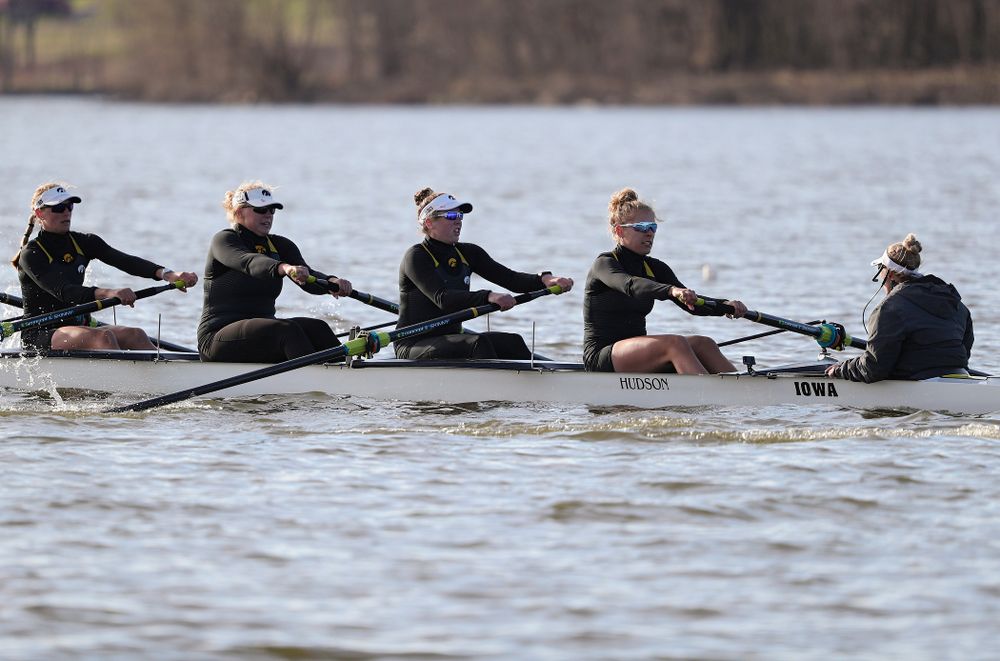 Iowa's Hunter Koenigsfeld (from left), Contessa Harold, Katie Pearson, Eve Stewart, and Logan Jones during their I Varsity 8 race against Minnesota in their Big Ten Double Dual Rowing Regatta at Lake Macbride in Solon on Saturday, Apr. 13, 2019. (Stephen Mally/hawkeyesports.com)