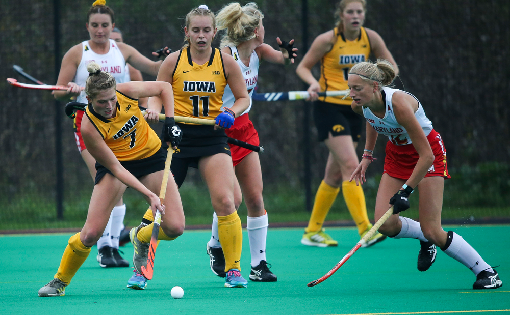 Iowa Hawkeyes midfielder Ellie Holley (7) passes the ball during a game against Maryland at Grant Field on October 14, 2018. (Tork Mason/hawkeyesports.com)