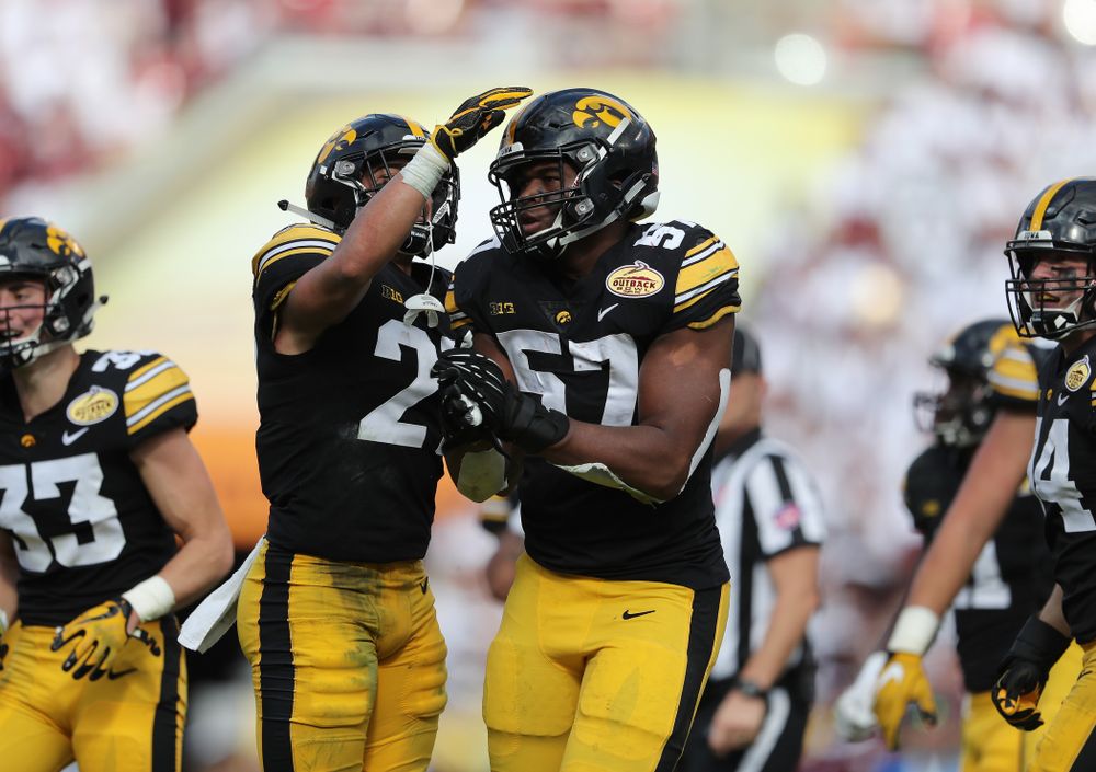 Iowa Hawkeyes defensive end Chauncey Golston (57) intercepts a pass during the Outback Bowl Tuesday, January 1, 2019 at Raymond James Stadium in Tampa, FL. (Brian Ray/hawkeyesports.com)