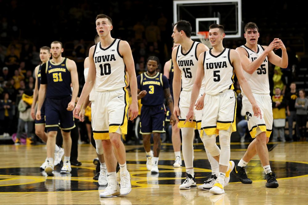 Iowa Hawkeyes guard Joe Wieskamp (10), forward Ryan Kriener (15), guard CJ Fredrick (5), and forward Luka Garza (55) against the Michigan Wolverines Friday, January 17, 2020 at Carver-Hawkeye Arena. (Brian Ray/hawkeyesports.com)
