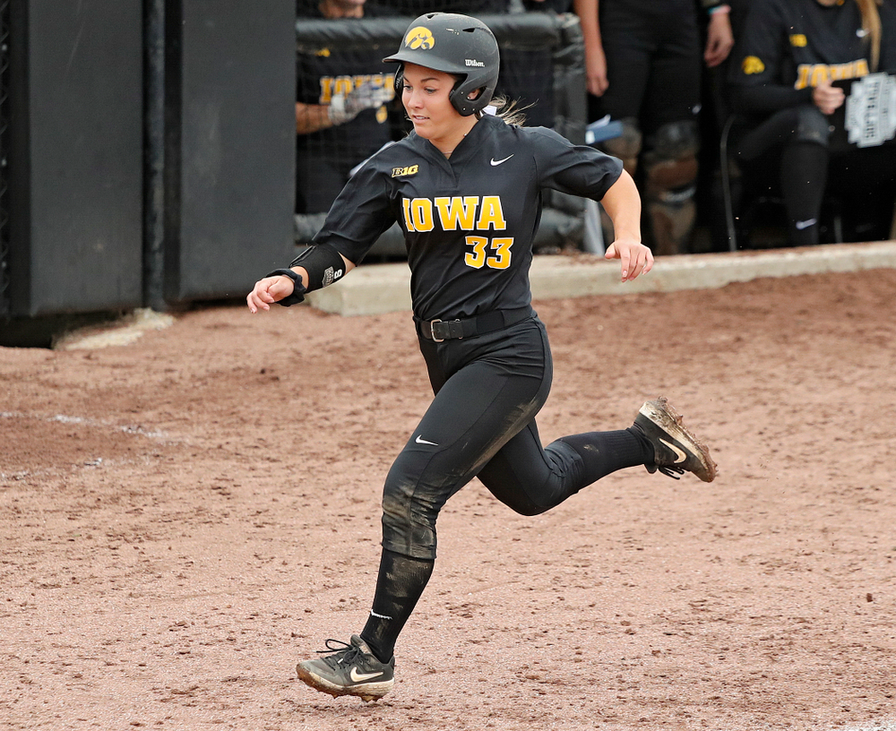 Iowa’s Riley Sheehy (33) scores a run during the sixth inning of their game against Iowa Softball vs Indian Hills Community College at Pearl Field in Iowa City on Sunday, Oct 6, 2019. (Stephen Mally/hawkeyesports.com)