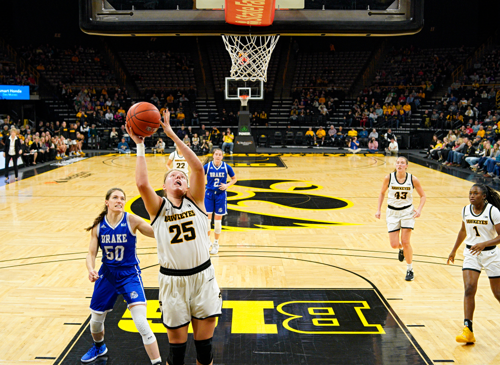 Iowa Hawkeyes forward Monika Czinano (25) scores a basket during the second quarter of their game at Carver-Hawkeye Arena in Iowa City on Saturday, December 21, 2019. (Stephen Mally/hawkeyesports.com)