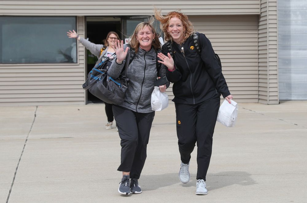 Associate head coach Jenni Fitzgerald and trainer Jennie Sertterh board the team plane to Greensboro, NC for the Regionals of the 2019 NCAA Women's Basketball Championships Thursday, March 28, 2019 at the Eastern Iowa Airport. (Brian Ray/hawkeyesports.com)