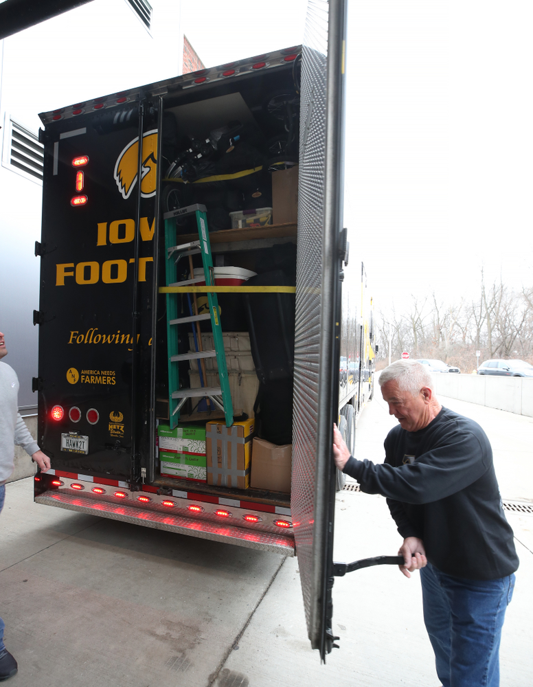 TanTara Transportation Corporation President Mike Riggan locks up the trailer before departing for Tampa, Florida Friday, December 21, 2018 at the Hansen Football Performance Center. (Brian Ray/hawkeyesports.com)