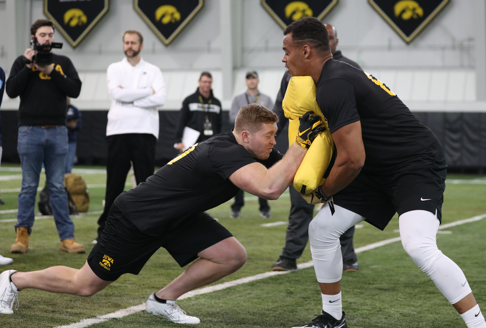 Iowa Hawkeyes defensive end Parker Hesse (40) and tight end Noah Fant (87) during the teamÕs annual Pro Day Monday, March 25, 2019 at the Hansen Football Performance Center. (Brian Ray/hawkeyesports.com)