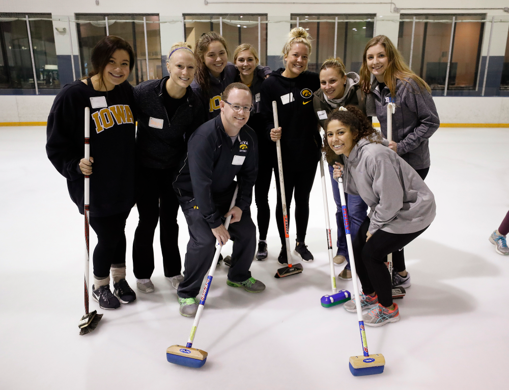 Members of the Iowa Softball team learn the sport of curling as part of a team building event Wednesday, January 10, 2018 at the Cedar Rapids Ice Arena. (Brian Ray/hawkeyesports.com)