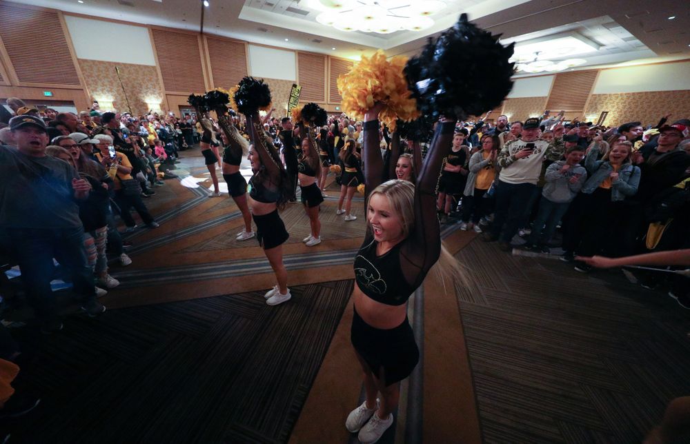 The Hawkeye Marching Band and the Iowa Spirit Squads perform during the Holiday Bowl Hawkeye Huddle Thursday, December 26, 2019 at the Hilton in downtown San Diego. (Brian Ray/hawkeyesports.com)