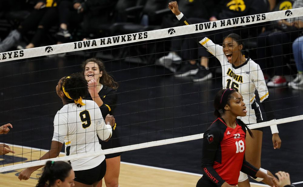 Iowa Hawkeyes outside hitter Taylor Louis (16) celebrates after winning a point during a match against Rutgers at Carver-Hawkeye Arena on November 2, 2018. (Tork Mason/hawkeyesports.com)