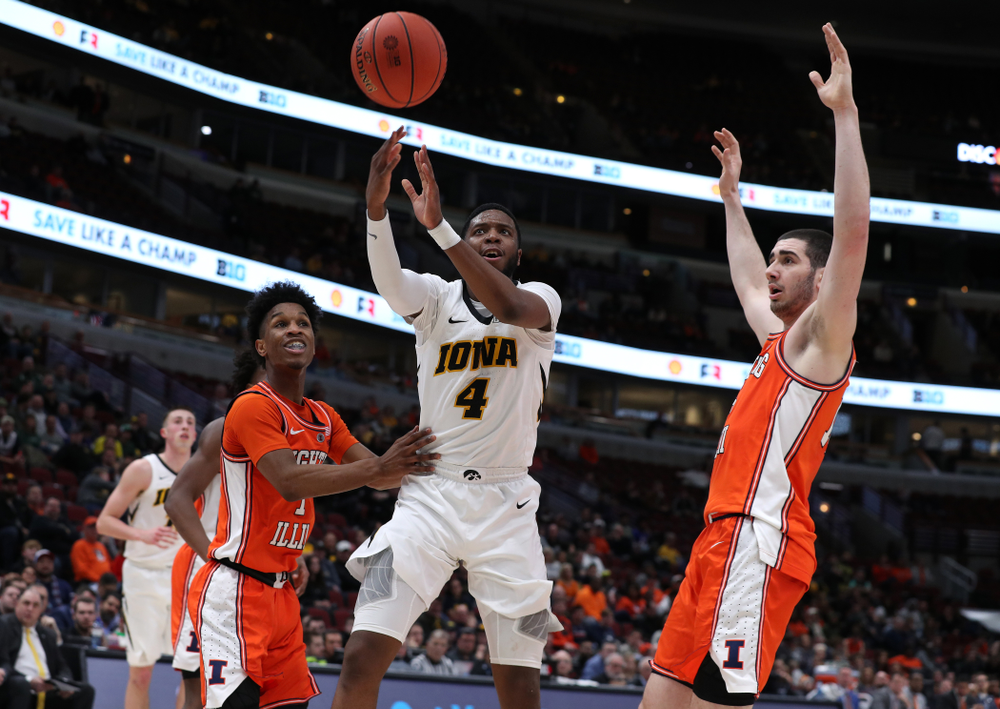Iowa Hawkeyes guard Isaiah Moss (4) against the Illinois Fighting Illini in the 2019 Big Ten Men's Basketball Tournament Thursday, March 14, 2019 at the United Center in Chicago. (Brian Ray/hawkeyesports.com)
