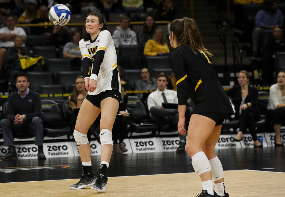 Iowa Hawkeyes defensive specialist Halle Johnston (4) bumps the ball during a match against Maryland at Carver-Hawkeye Arena on November 23, 2018. (Tork Mason/hawkeyesports.com)