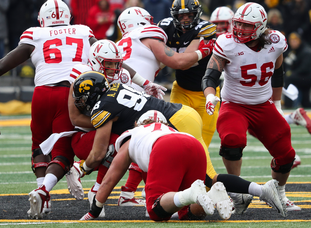 Iowa Hawkeyes defensive end Anthony Nelson (98) sacks the quarterback during a game against Nebraska at Kinnick Stadium on November 23, 2018. (Tork Mason/hawkeyesports.com)