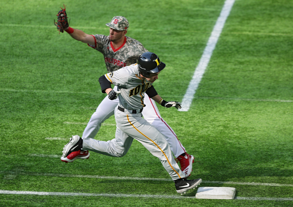 Iowa Hawkeyes utility player Sam Link (3) reaches on an error during the third inning of their CambriaCollegeClassic game at U.S. Bank Stadium in Minneapolis, Minn. on Friday, February 28, 2020. (Stephen Mally/hawkeyesports.com)