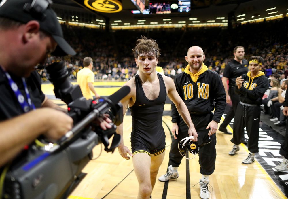 IowaÕs Austin DeSanto wrestles WisconsinÕs Seth Gross at 133 pounds Sunday, December 1, 2019 at Carver-Hawkeye Arena. DeSanto won the match 6-2. (Brian Ray/hawkeyesports.com)