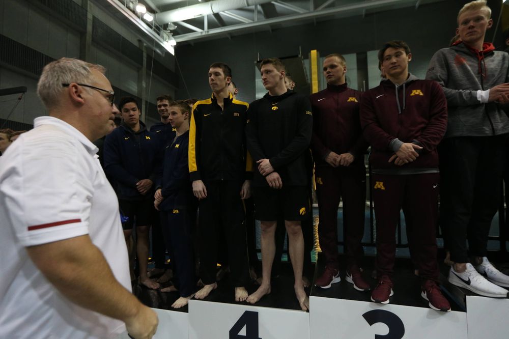 Iowa's Joe Myhre, Jack Smith, Will Scott, and Steve Fiolic after the 200-yard freestyle relay race Friday, March 1, 2019 at the Campus Recreation and Wellness Center. (Lily Smith/hawkeyesports.com)