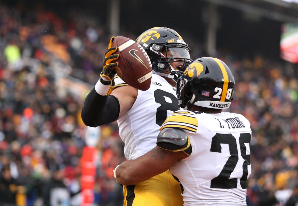 Iowa Hawkeyes tight end Noah Fant (87) and running back Toren Young (28) against the Illinois Fighting Illini Saturday, November 17, 2018 at Memorial Stadium in Champaign, Ill. (Brian Ray/hawkeyesports.com)