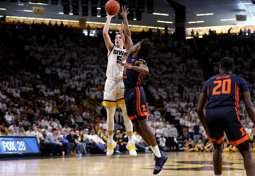 Iowa Hawkeyes guard CJ Fredrick (5) pulls up for a three point basket against the Illinois Fighting Illini Sunday, February 2, 2020 at Carver-Hawkeye Arena. (Brian Ray/hawkeyesports.com)