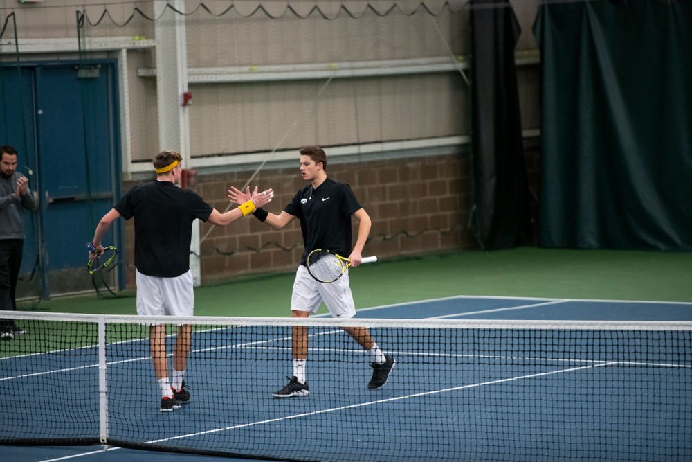 The Iowa men's tennis team competes against Cornell in The Rise Tennis Center in Ithaca, NY on Sunday, Feb. 24, 2019.