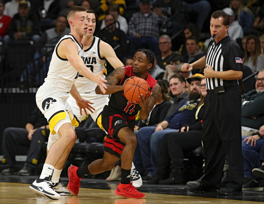 Iowa Hawkeyes guard Joe Wieskamp (10) and guard Connor McCaffery (30) pressure SIU Edwardsville Cougars guard Tyresse Williford (11) during the first half of their game at Carver-Hawkeye Arena in Iowa City on Friday, Nov 8, 2019. (Stephen Mally/hawkeyesports.com)