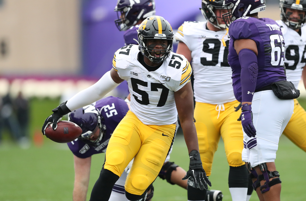 Iowa Hawkeyes defensive end Chauncey Golston (57) celebrates after intercepting a pass against the Northwestern Wildcats Saturday, September 28, 2019 at Kinnick Stadium. (Max Allen/hawkeyesports.com)