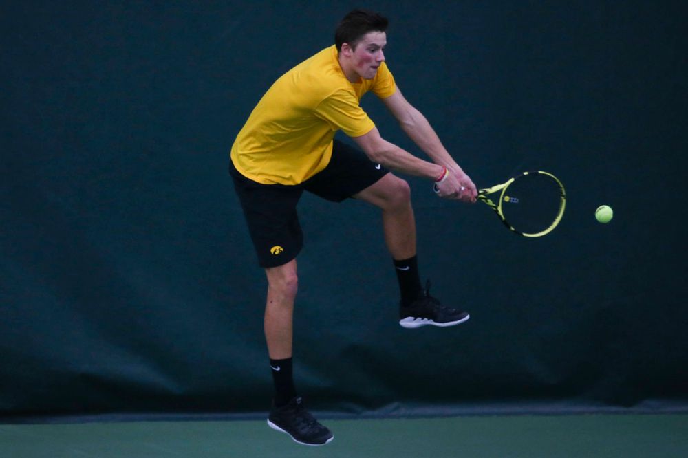 Iowa's Piotr Smietana at a tennis match vs Drake Friday, March 8, 2019 at the Hawkeye Tennis and Recreation Complex. (Lily Smith/hawkeyesports.com)