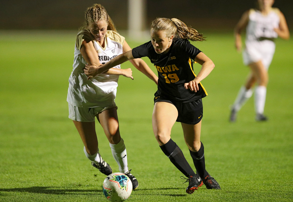 Iowa forward Jenny Cape (19) sprints towards the ball during the second half of their match against Western Michigan at the Iowa Soccer Complex in Iowa City on Thursday, Aug 22, 2019. (Stephen Mally/hawkeyesports.com)