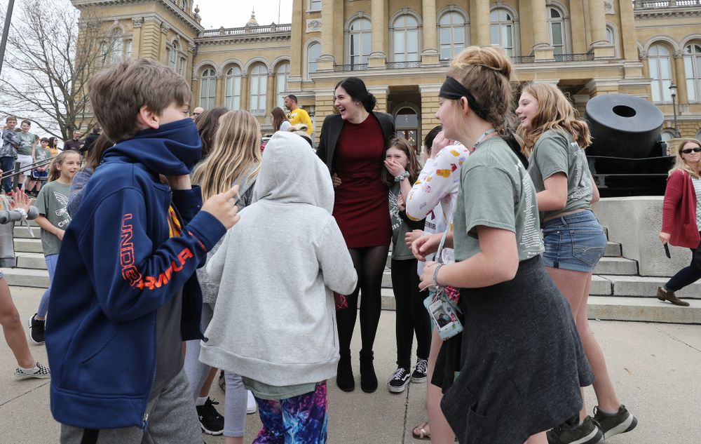 Iowa’s Megan Gustafson takes photos with a group of students on a field trip as she leaves the Iowa State Capitol Wednesday, April 24, 2019 in Des Moines. (Brian Ray/hawkeyesports.com)