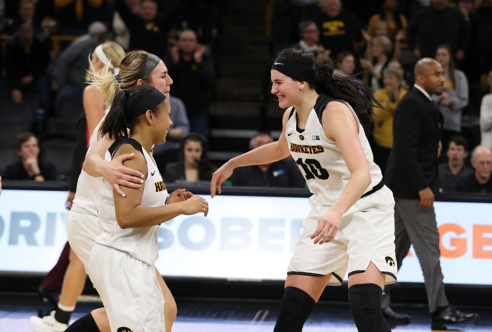 Iowa Hawkeyes forward Megan Gustafson (10), forward Hannah Stewart (21), and guard Tania Davis (11) against the Nebraska Cornhuskers Thursday, January 3, 2019 at Carver-Hawkeye Arena. (Brian Ray/hawkeyesports.com)