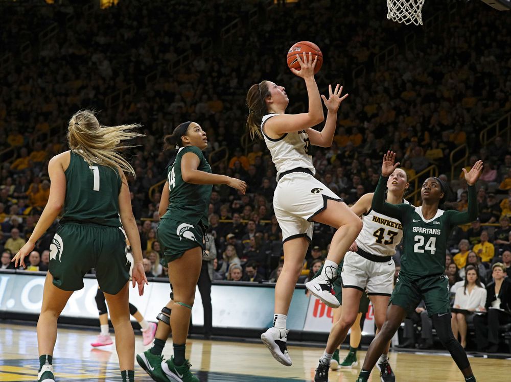 Iowa Hawkeyes guard Gabbie Marshall (24) makes a basket during the fourth quarter of their game at Carver-Hawkeye Arena in Iowa City on Sunday, January 26, 2020. (Stephen Mally/hawkeyesports.com)