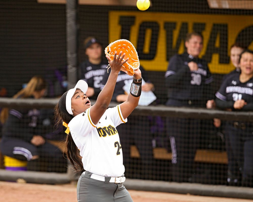 Iowa Hawkeyes DoniRae Mayhew (24) pulls in a pop up for an out during the second inning of their Big Ten Conference softball game at Pearl Field in Iowa City on Friday, Mar. 29, 2019. (Stephen Mally/hawkeyesports.com)