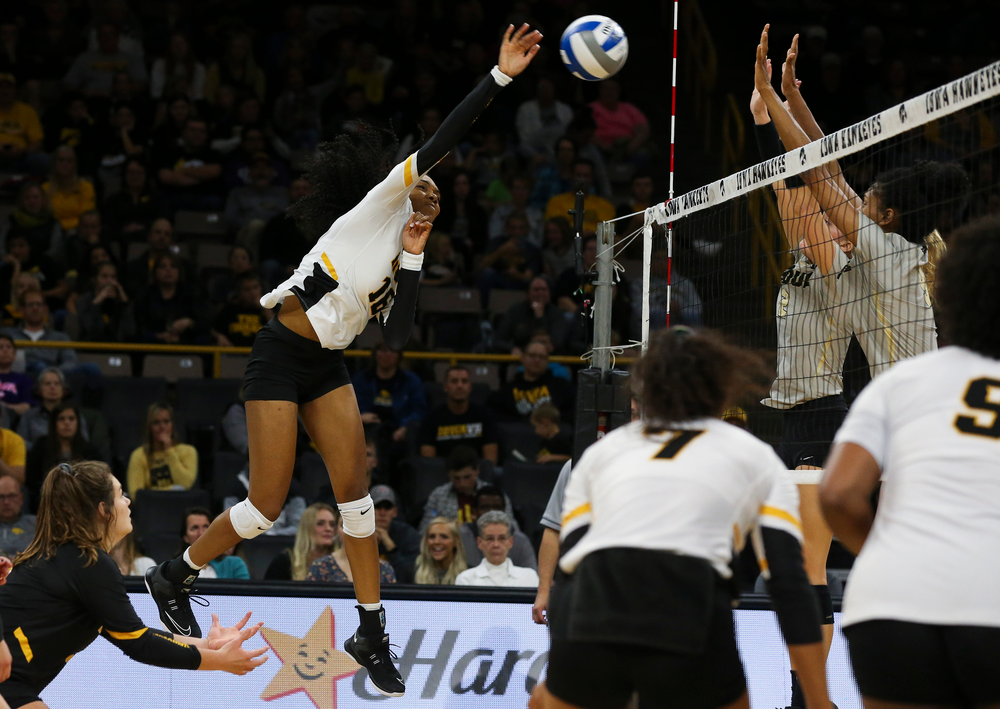 Iowa Hawkeyes outside hitter Taylor Louis (16) spikes the ball during a game against Purdue at Carver-Hawkeye Arena on October 13, 2018. (Tork Mason/hawkeyesports.com)
