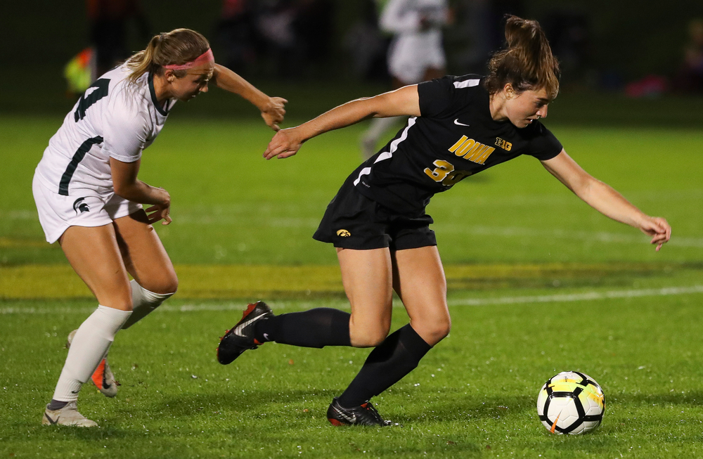 Iowa Hawkeyes forward Devin Burns (30) dribbles the ball during a game against Michigan State at the Iowa Soccer Complex on October 12, 2018. (Tork Mason/hawkeyesports.com)