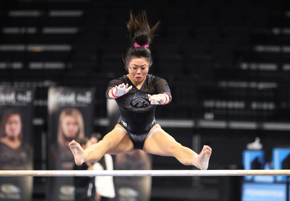 Iowa's Clair Kaji competes on the bars during their meet against the Minnesota Golden Gophers Saturday, January 19, 2019 at Carver-Hawkeye Arena. (Brian Ray/hawkeyesports.com)