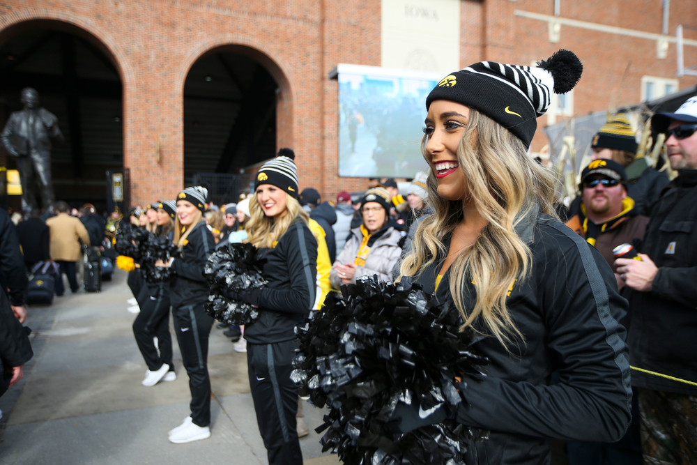 Iowa Spirit Squad members cheer during Iowa football vs Minnesota on Saturday, November 16, 2019 at Kinnick Stadium. (Lily Smith/hawkeyesports.com)