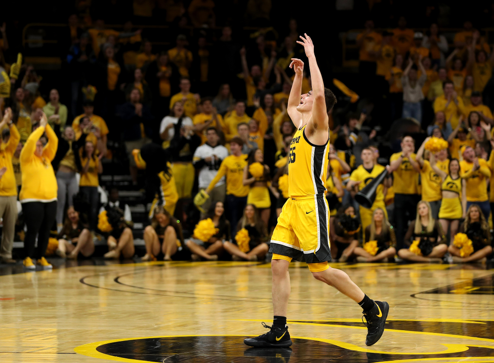 Iowa Hawkeyes forward Luka Garza (55) celebrates late in the game against the Rutgers Scarlet Knights Wednesday, January 22, 2020 at Carver-Hawkeye Arena. (Brian Ray/hawkeyesports.com)
