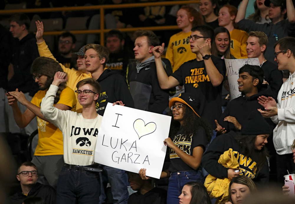Iowa fans hold up a sign supporting center Luka Garza (not pictured) before their game at Carver-Hawkeye Arena in Iowa City on Friday, Nov 8, 2019. (Stephen Mally/hawkeyesports.com)
