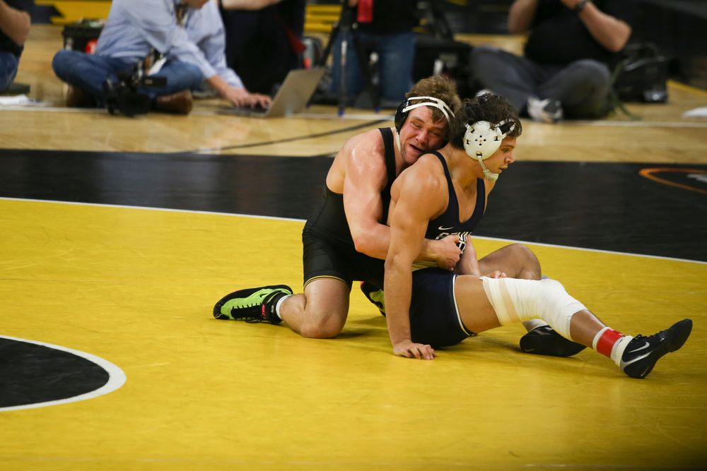 Iowa’s Jacob Warner wrestles Penn State’s Shakur Rasheed during their 197 lbs match during the Iowa wrestling dual vs Penn State on Friday, January 31, 2020 at Carver-Hawkeye Arena. (Lily Smith/hawkeyesports.com)