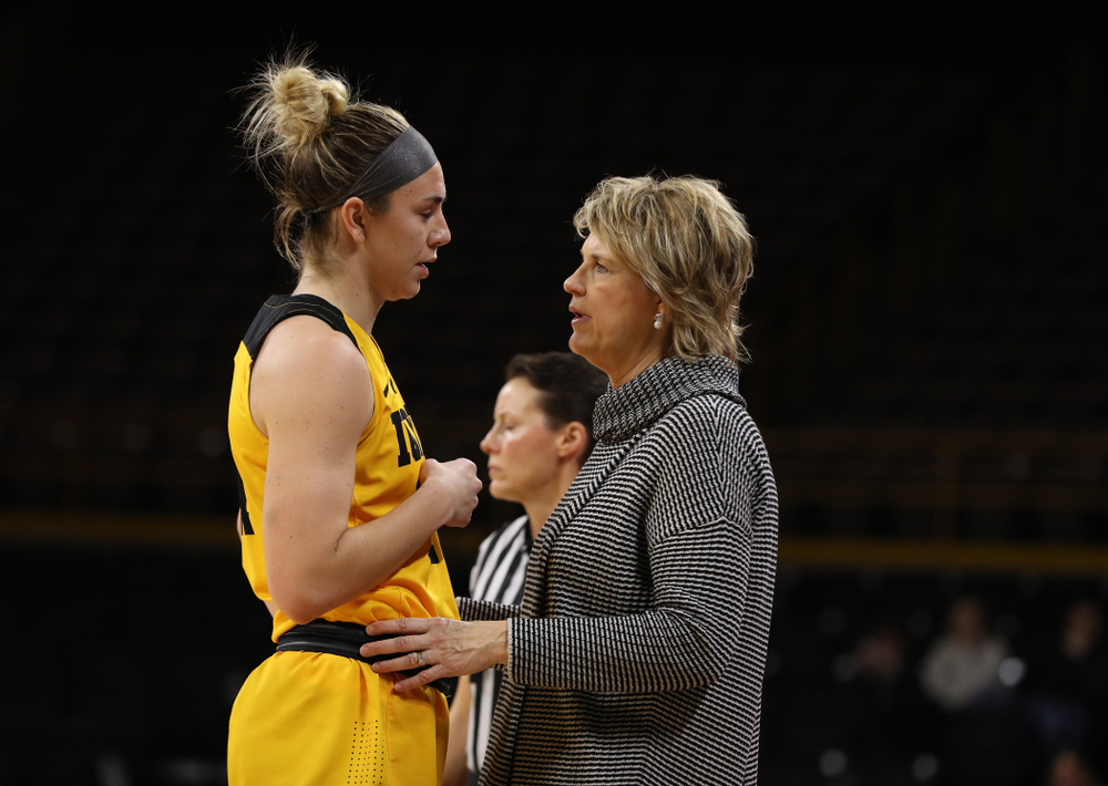 Iowa Hawkeyes forward Hannah Stewart (21) and head coach Lisa Bluder against the Michigan State Spartans Thursday, February 7, 2019 at Carver-Hawkeye Arena. (Brian Ray/hawkeyesports.com)