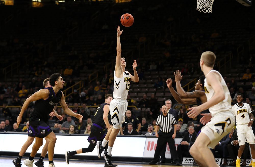 Iowa Hawkeyes guard Austin Ash (13) against the Western Carolina Catamounts Tuesday, December 18, 2018 at Carver-Hawkeye Arena. (Brian Ray/hawkeyesports.com)
