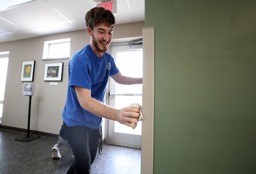 Members of the MenÕs Gymnastics team volunteer at CommUnity Crisis Services and Food Bank during the annual Iowa Athletics Day of Caring Sunday, April 28, 2019 in Iowa City. (Brian Ray/hawkeyesports.com)