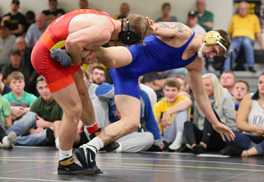 Iowa’s Cash Wilcke (from left) controls the leg of Abe Assad during their preseason match at the Dan Gable Wrestling Complex at Carver-Hawkeye Arena in Iowa City on Friday, Nov 8, 2019. (Stephen Mally/hawkeyesports.com)