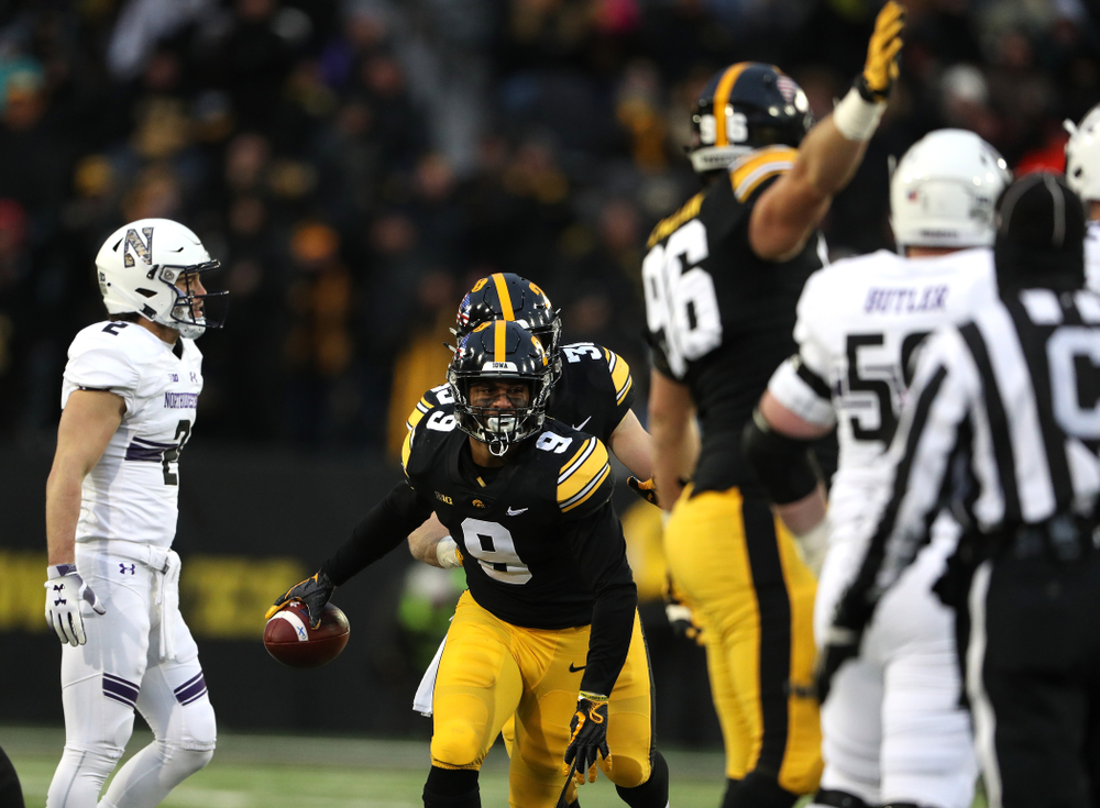Iowa Hawkeyes defensive back Geno Stone (9) intercepts a pass against the Northwestern Wildcats Saturday, November 10, 2018 at Kinnick Stadium. (Brian Ray/hawkeyesports.com)