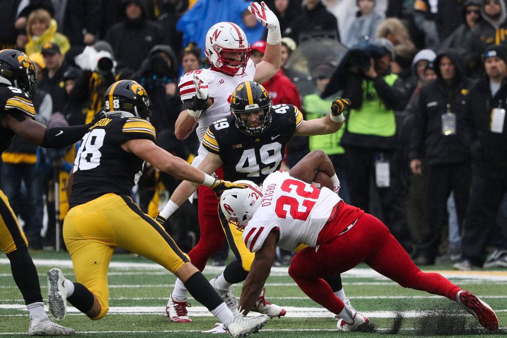 Iowa Hawkeyes linebacker Nick Niemann (49) makes a tackle during a game against Nebraska at Kinnick Stadium on November 23, 2018. (Tork Mason/hawkeyesports.com)