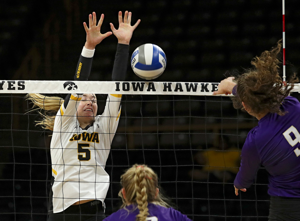 Iowa’s Meghan Buzzerio (5) blocks a shot for a score during their Big Ten/Pac-12 Challenge match at Carver-Hawkeye Arena in Iowa City on Saturday, Sep 7, 2019. (Stephen Mally/hawkeyesports.com)
