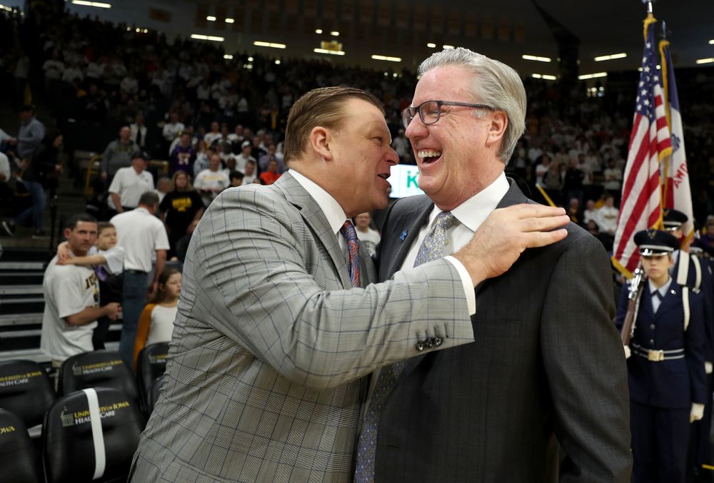 Iowa Hawkeyes head coach Fran McCaffery talks with Illinois Fighting Illini head coach Brad Underwood Sunday, February 2, 2020 at Carver-Hawkeye Arena. (Brian Ray/hawkeyesports.com)
