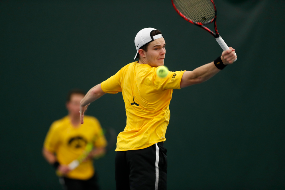 Jonas Larsen and Kareem Allaf play a doubles match against the Illinois Fighting Illini Saturday, March 31, 2018 at Hawkeye Tennis and Recreation Center. (Brian Ray/hawkeyesports.com)